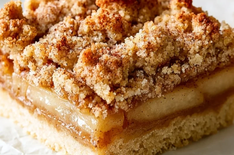 Deliciously baked Apple Crisp Bars topped with crunchy oats and fresh apples.