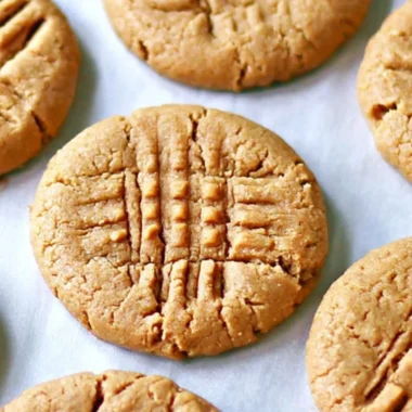 Cozy 3-ingredient peanut butter cookies on a baking tray.