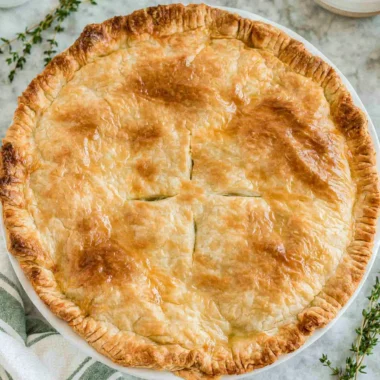Delicious cozy chicken pot pie served in a rustic dish