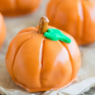 No-bake pumpkin-shaped Oreo balls decorated for fall treats