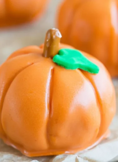 No-bake pumpkin-shaped Oreo balls decorated for fall treats