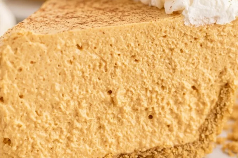 Delicious fluffy marshmallow pumpkin pie served on a plate
