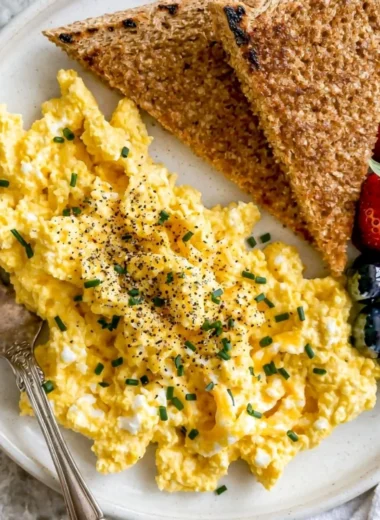 High-protein scrambled eggs with cottage cheese served in a bowl