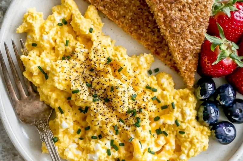 High-protein scrambled eggs with cottage cheese served in a bowl