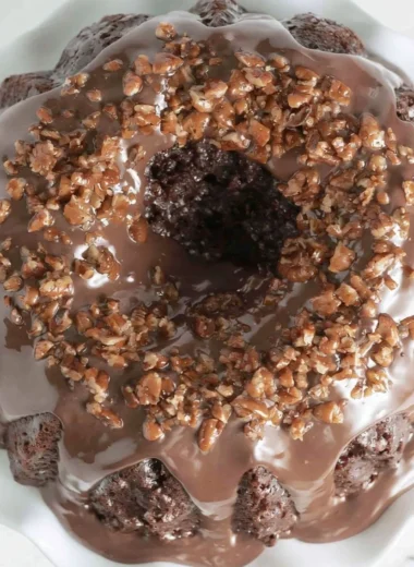 Delicious Texas Sheet Cake Bundt Cake served on a white plate