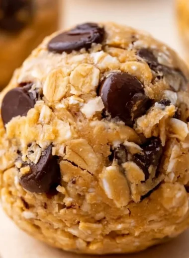 Delicious and nutritious cozy oatmeal protein balls on a wooden plate.