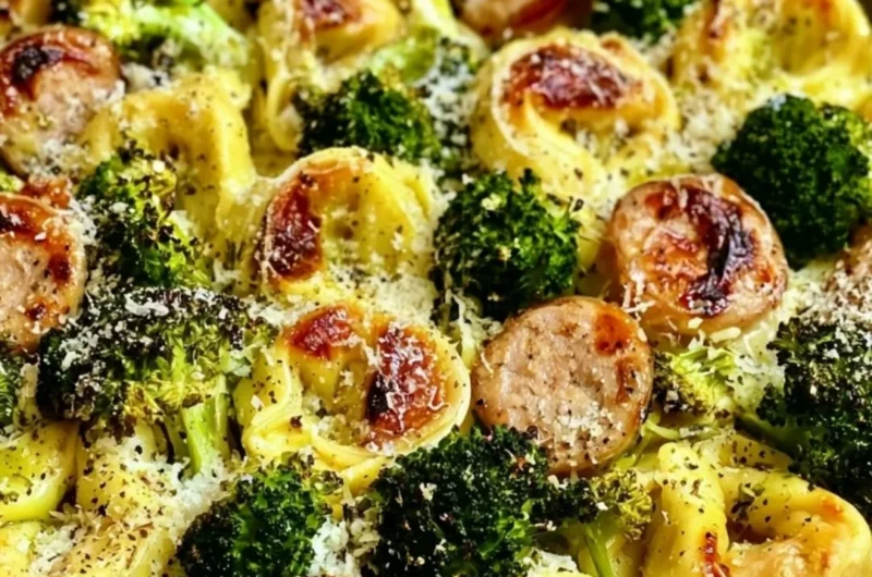 Sheet pan broccoli tortellini bake with melted cheese and fresh vegetables