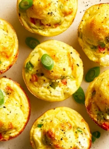Veggie and egg muffins baked with fresh vegetables and herbs