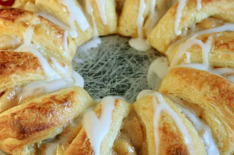 Freshly baked Apple Crescent Ring with flaky pastry and apple filling