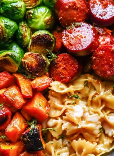 Autumn dinner with sausage, pasta, Brussels sprouts, and butternut squash dish
