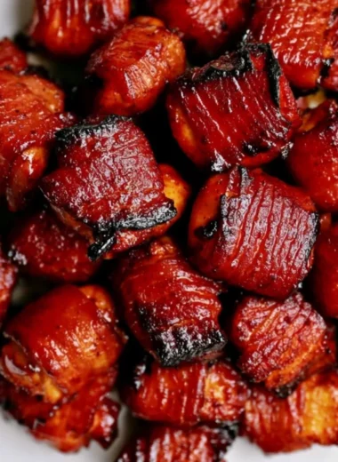 Deliciously crispy Bacon Chicken Bites served on a plate.