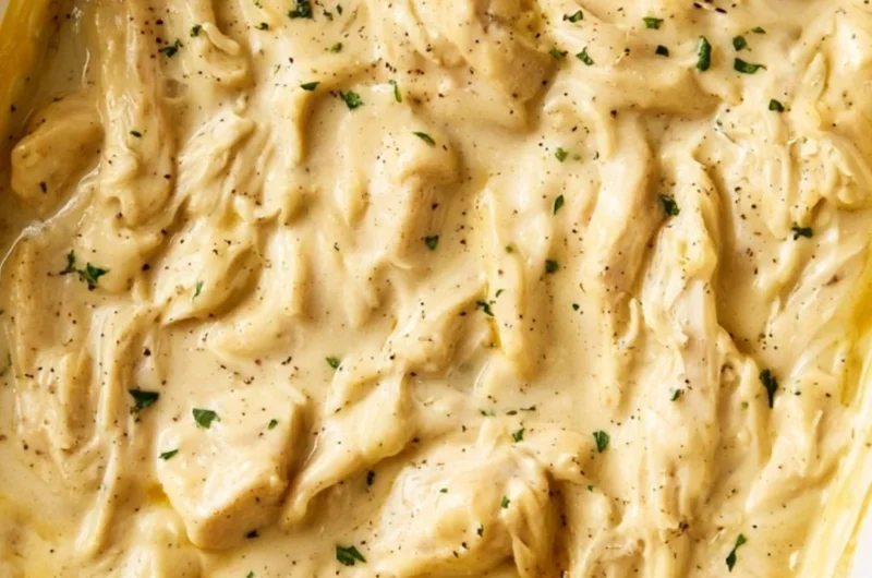 Delicious plate of chicken and gravy served with sides
