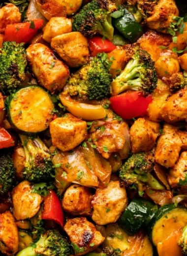 Cozy chicken and vegetables skillet dish in a cast iron pan.