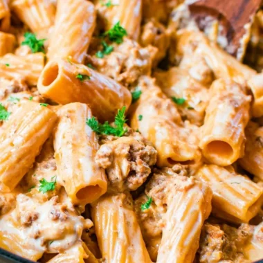 Cozy homemade cheeseburger pasta served in a bowl with fresh herbs