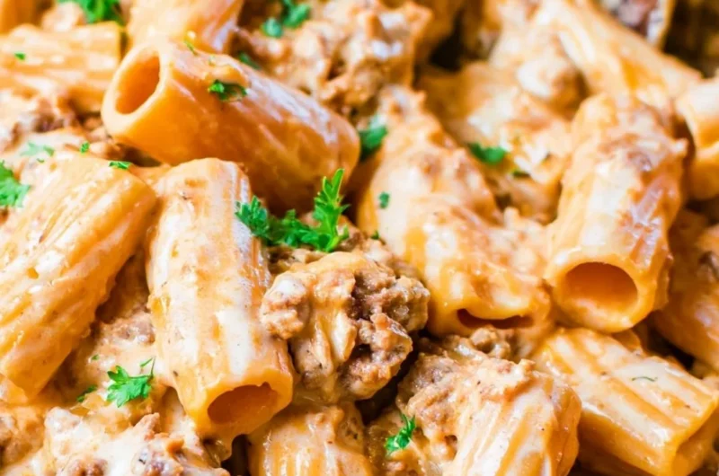 Cozy homemade cheeseburger pasta served in a bowl with fresh herbs