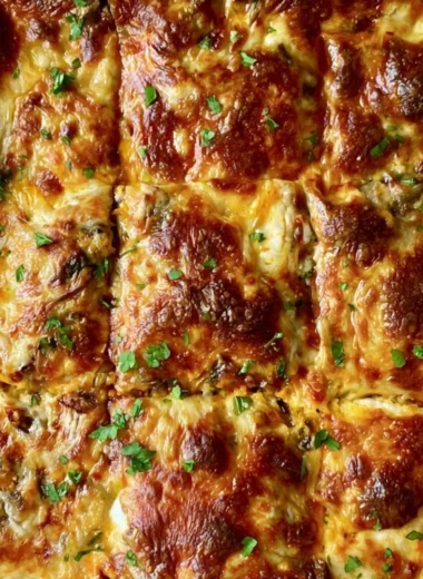 Invisible butternut squash, spinach, and mushroom lasagna in a baking dish
