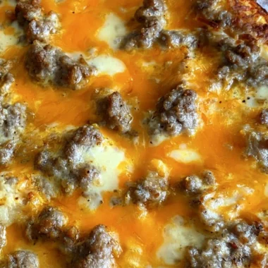 Delicious Christmas morning casserole served with festive garnishes.