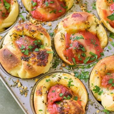 Meatball stuffed garlic bread served as an easy appetizer for gatherings.