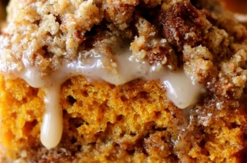 Slice of Pumpkin Streusel Coffee Cake topped with a buttery streusel crust.