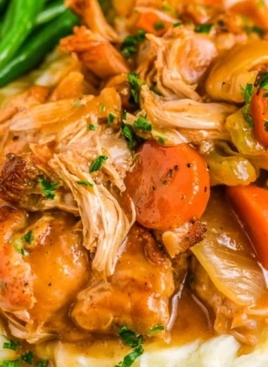 Delicious slow cooker chicken pot roast with vegetables and herbs